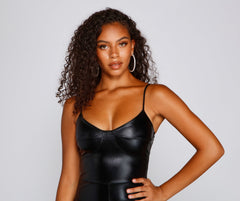 Sleek And Mysterious Faux Leather Catsuit